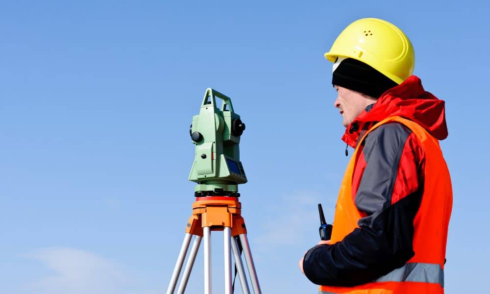 topographic survey miami fl - ALTA SURVEY Miami Surveyor performing a topographic survey with total station