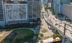 Alta title survey land transfer case - ALTA SURVEY Miami Aerial view of downtown high-rise buildings and roadways representing complex land ownership and the importance of an ALTA title survey.
