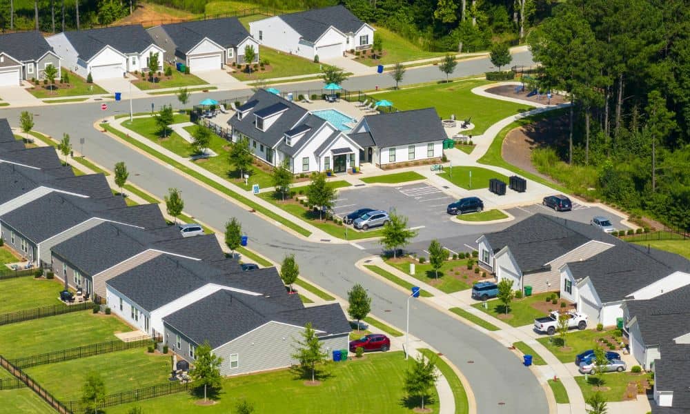 Aerial view of a residential neighborhood showing lot shapes and block layout, illustrating how a property survey reveals development potential