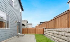 Backyard fence between neighboring homes - ALTA SURVEY Miami Wooden fence between two homes highlighting clear land survey property boundaries in a residential neighborhood