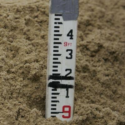 Survey grade rod elevation measurement detail - ALTA SURVEY Miami Surveyor elevation rod showing ground level measurement for flood risk survey